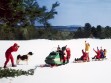 Snowmobile pulling 9 sleds, Francetown, NH, 1969